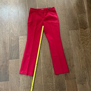 New with tags. Express dress slacks, dark red, size 10.